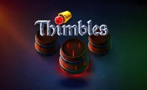 Evoplay Thimbles Bet logo. A set of three wooden cups arranged on a table, representing the Thimbles game, with the title “Thimbles” above in a medieval-style font. A red gem is placed beneath one of the cups.