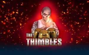 Onlyplay Thimbles Bet logo. A muscular character with a skull tattoo on his face, standing behind a set of golden thimbles with the words “The Thimbles” at the bottom. The background is lit in a fiery red glow.